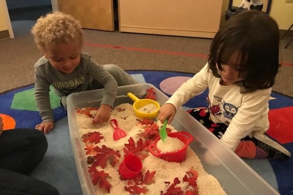 Children playing with sensory toys