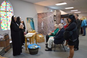 The Reformation Walk - Fish Monger Booth with 3 nuns who were smuggled out of the convent